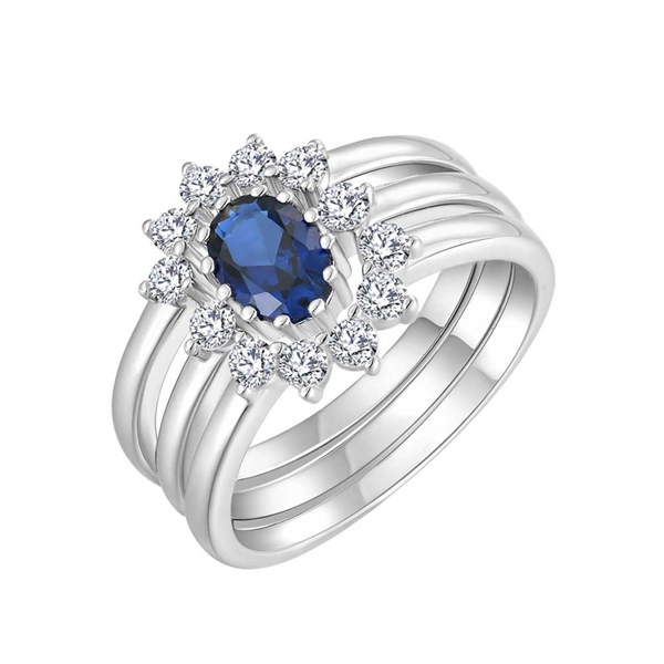 Bred ring i rhodineret sølv med safir og zirkonia